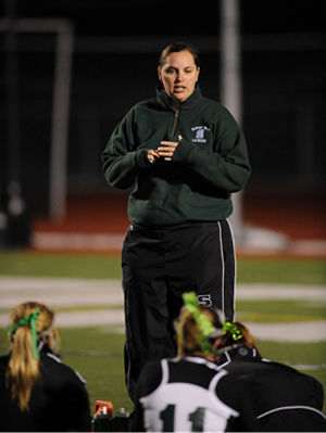 Coaching, guiding, inspiring: Coach Hopkins doing what she loves best