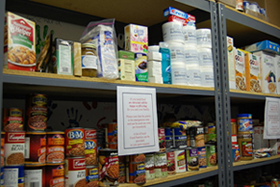 Shelves are stacked high with generous donations but volunteers are needed to keep the closet organized and restocked