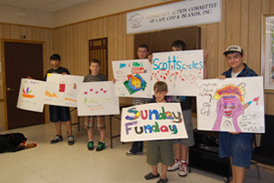 Sign makers volunteer at the 2010 Sunday Funday Summer Fundraiser