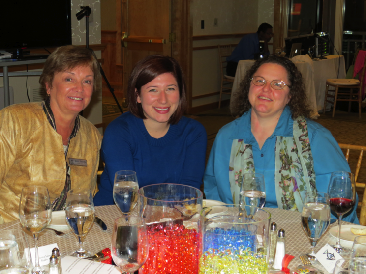 Donna Sabecky, President/CEO, Amanda Bergeron-Manzone, Case Manager, and Lori, CCI client enjoy the Gala by the Sea at the Wequassett Resort in Chatham. 